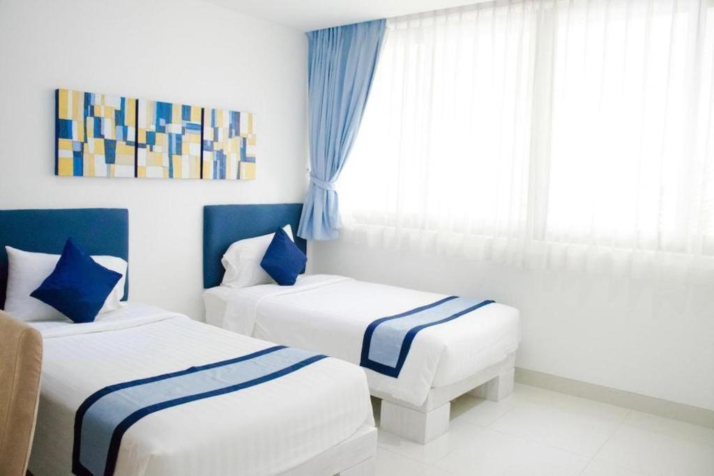 Sansuri Resort Praia de Surin Exterior foto